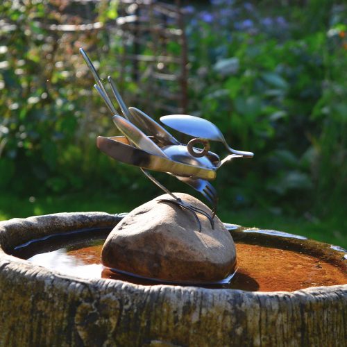 Up-cycled cutlery bird in bird bath