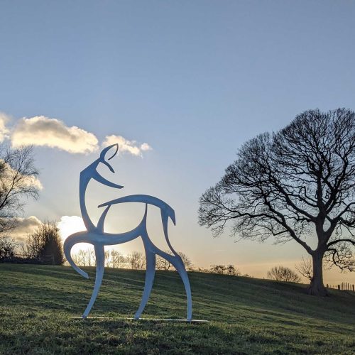 large stainless steel deer sculpture